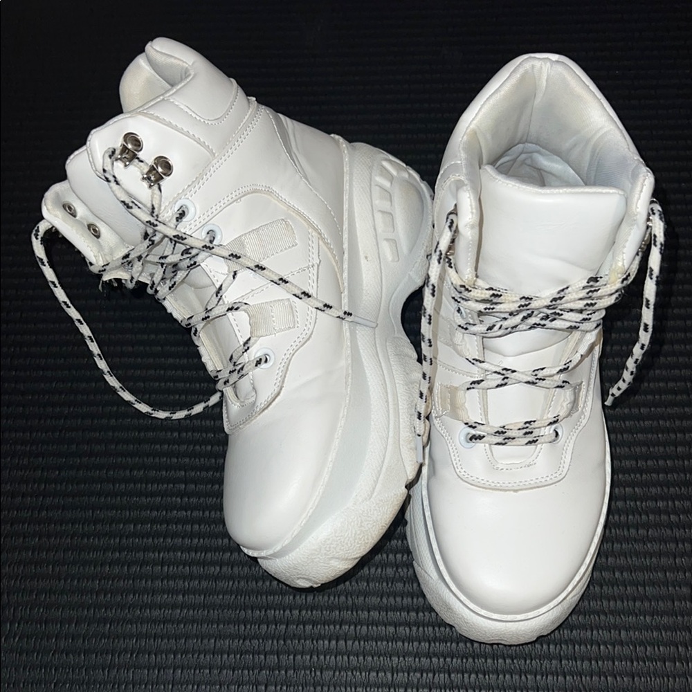 White boots (similar to Naked Wolfe)